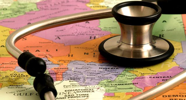Concept - health care in Africa - map and stethoscope